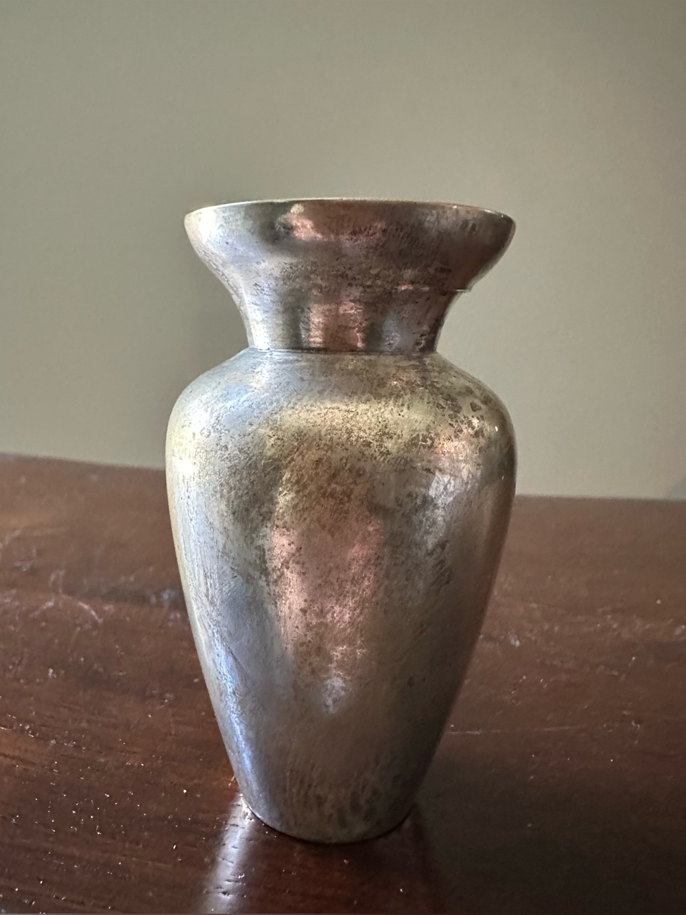 Small metal vase or object